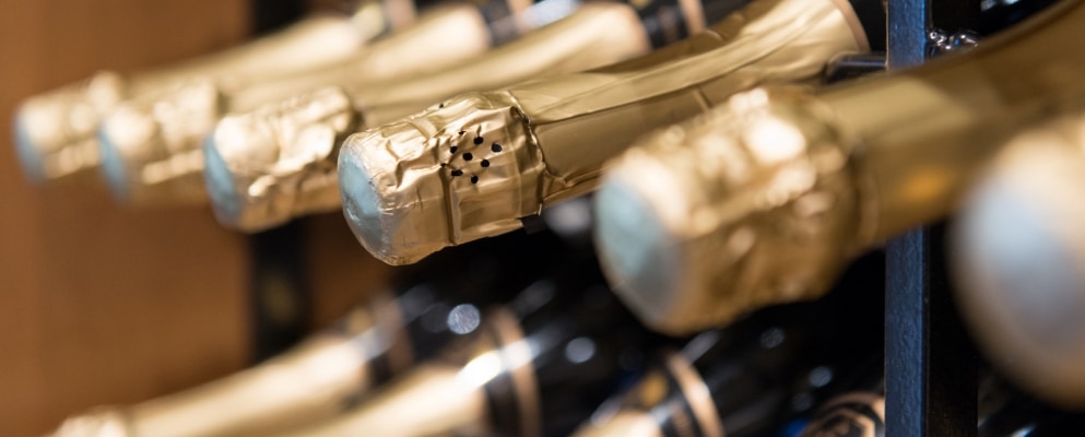 sparkling wine in a storage cabinet